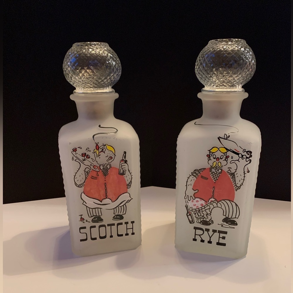 Vintage decanters, Scotch and Rye.